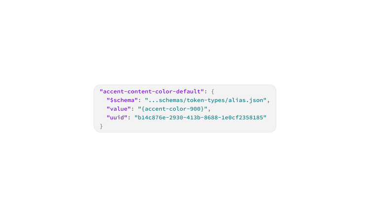 Code snippet showing a JSON token definition for "accent-content-color-default," including its schema reference, a value pointing to "{accent-color-900}," and a UUID.