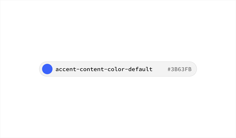 Design token swatch labeled "accent-content-color-default" showing a solid blue circle next to the hex value #3B63FB, displayed in a light gray pill-shaped container on a white background